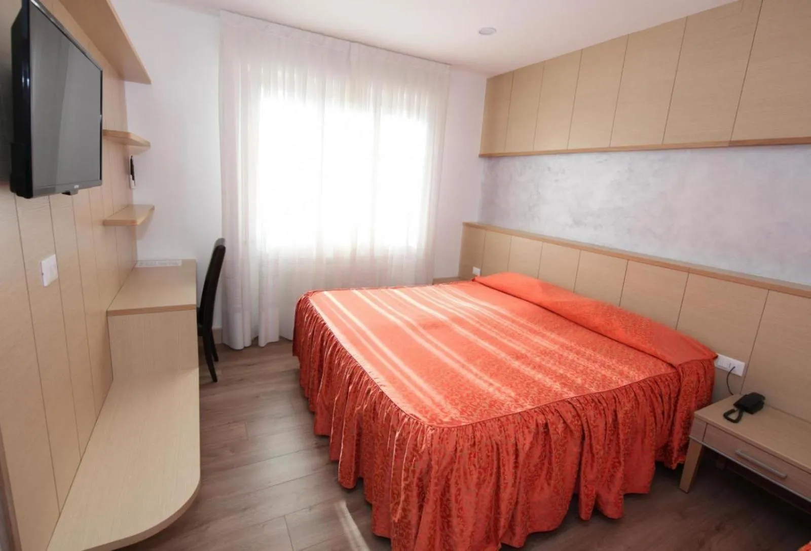 Bed in Al Benvenuto Hotel & Restaurant