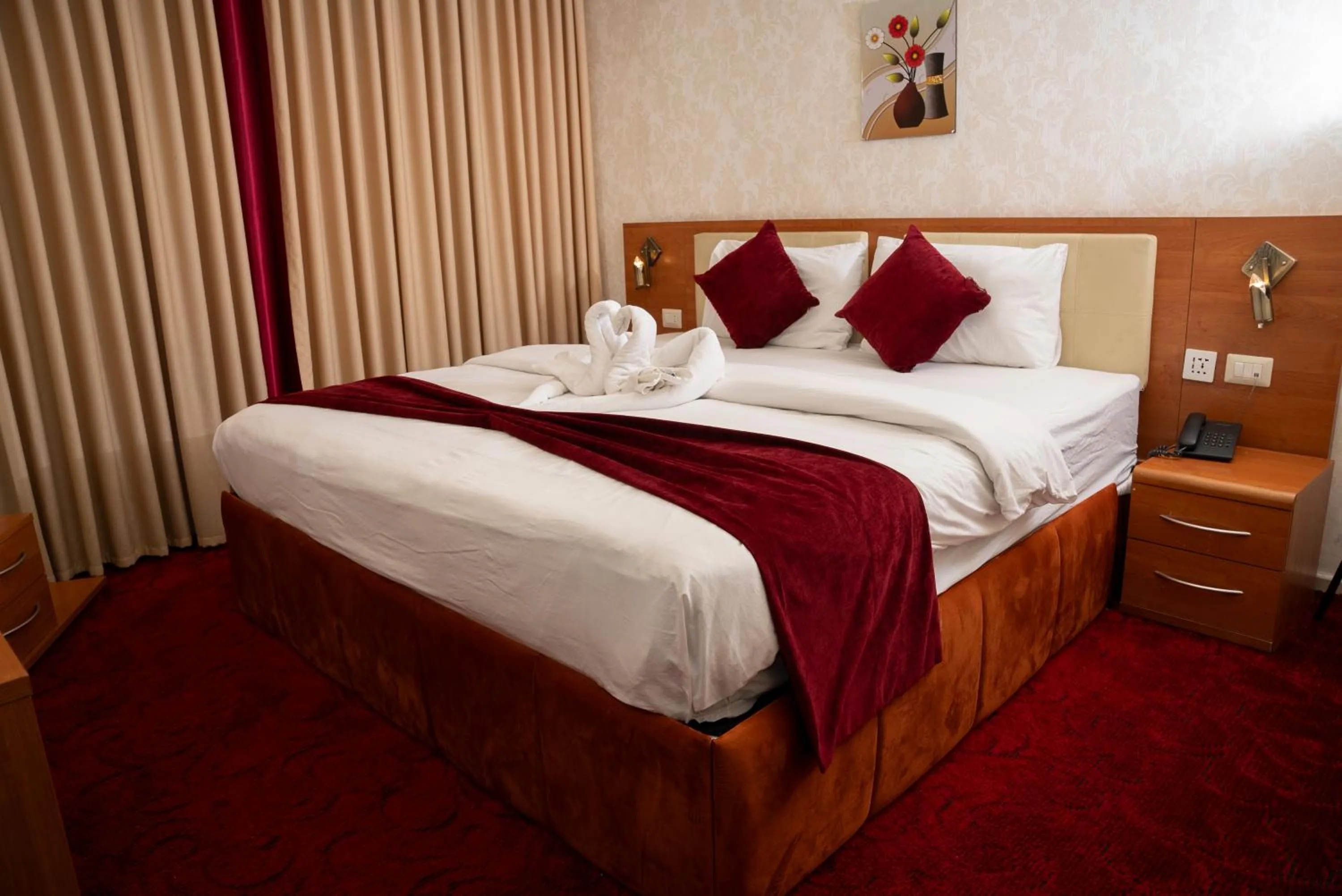 Bed in Sama Paris Plaza Hotel