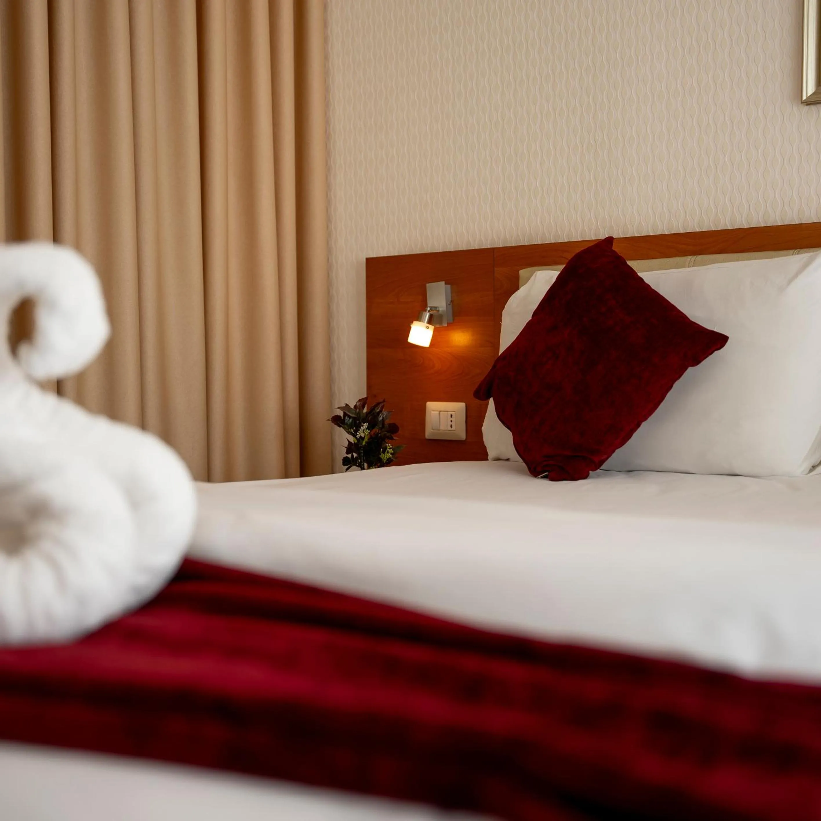 Bed in Sama Paris Plaza Hotel
