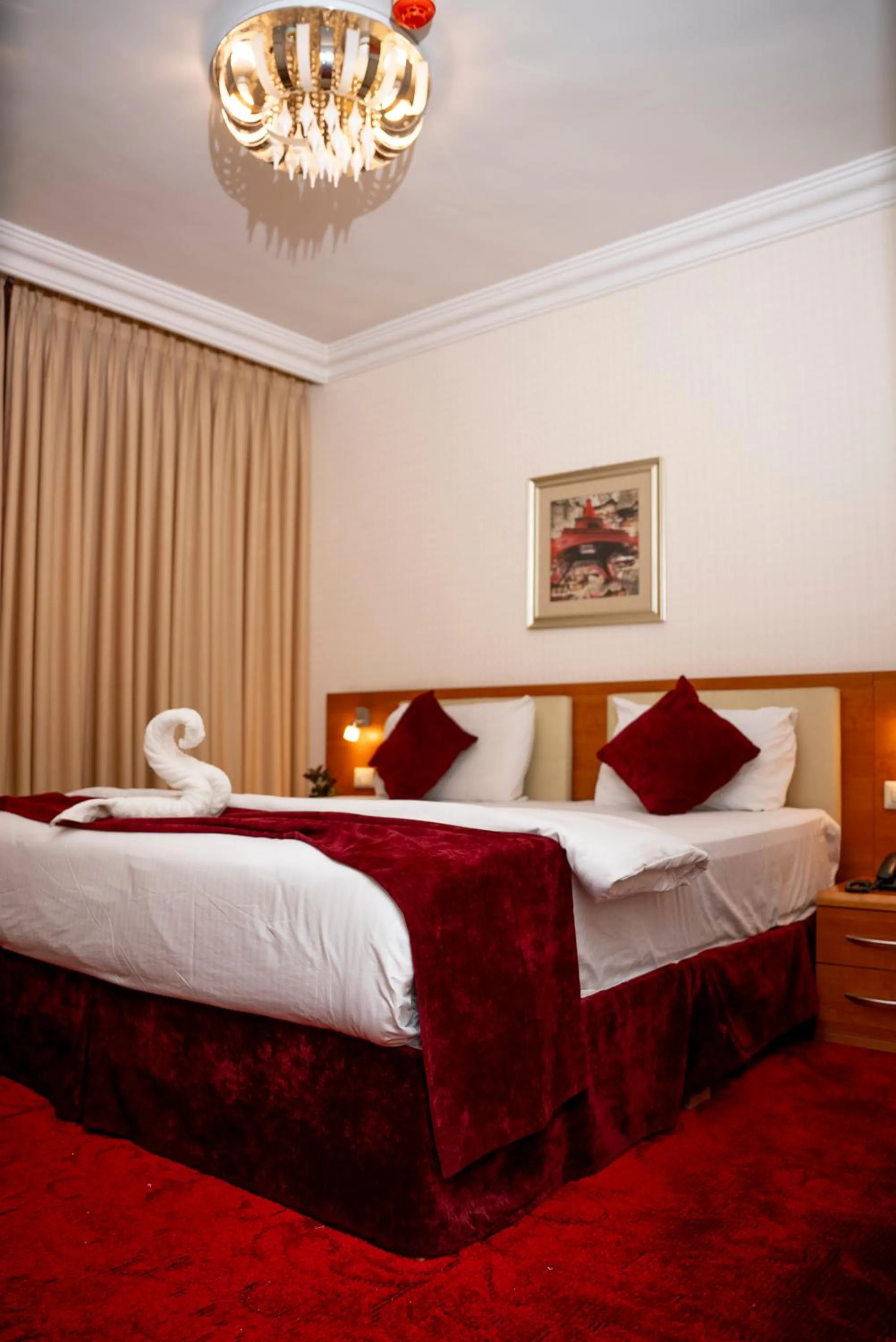 Bed in Sama Paris Plaza Hotel
