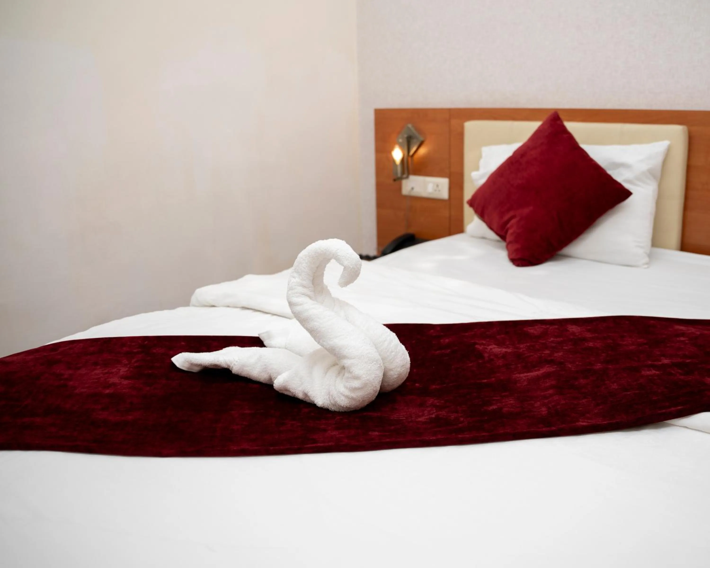Bed in Sama Paris Plaza Hotel