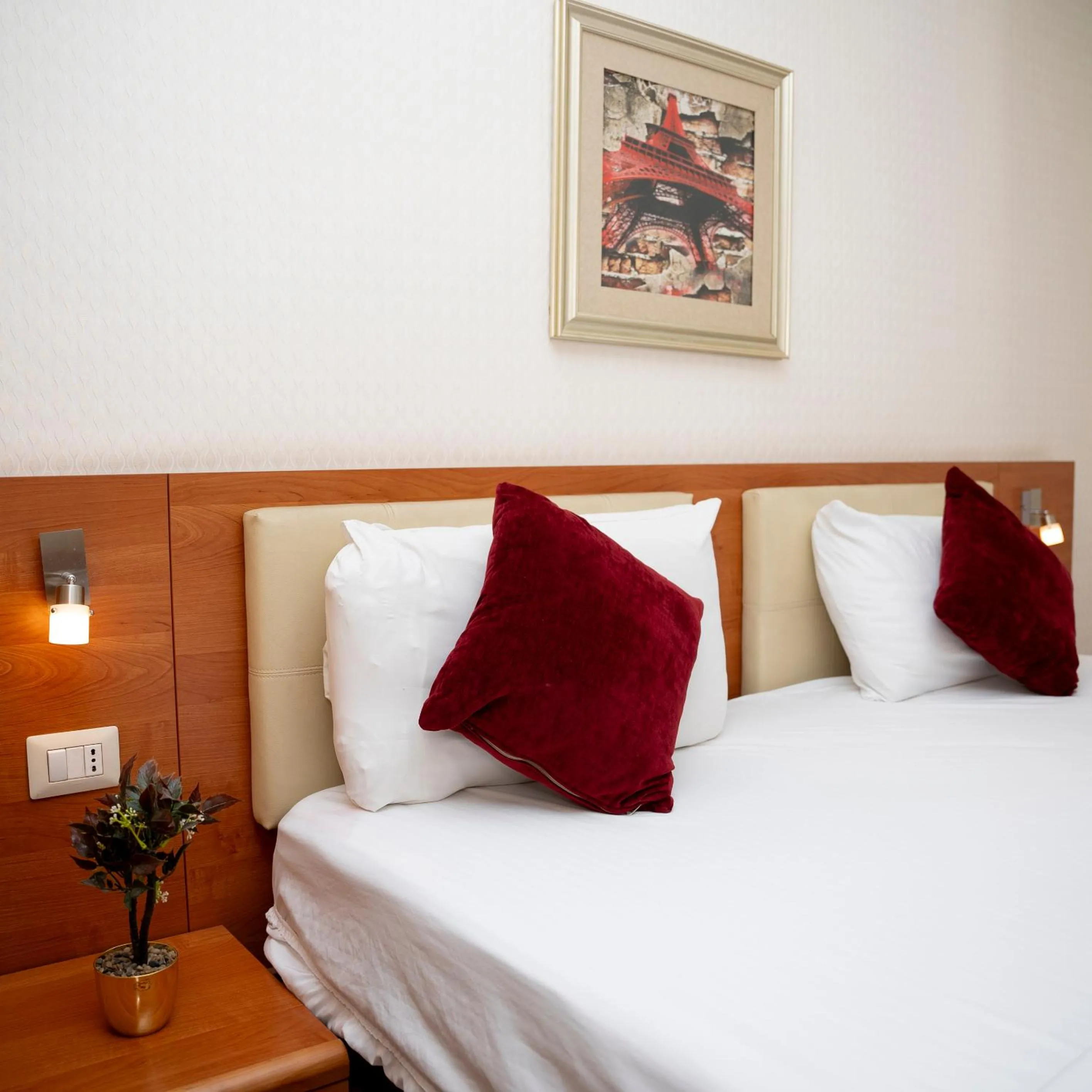 Bed in Sama Paris Plaza Hotel
