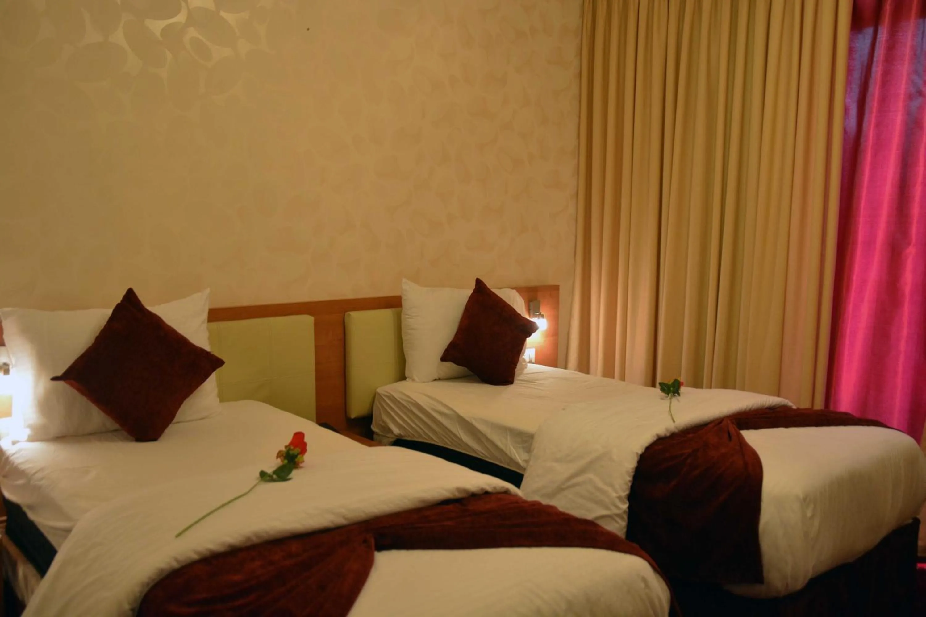 Bed in Sama Paris Plaza Hotel