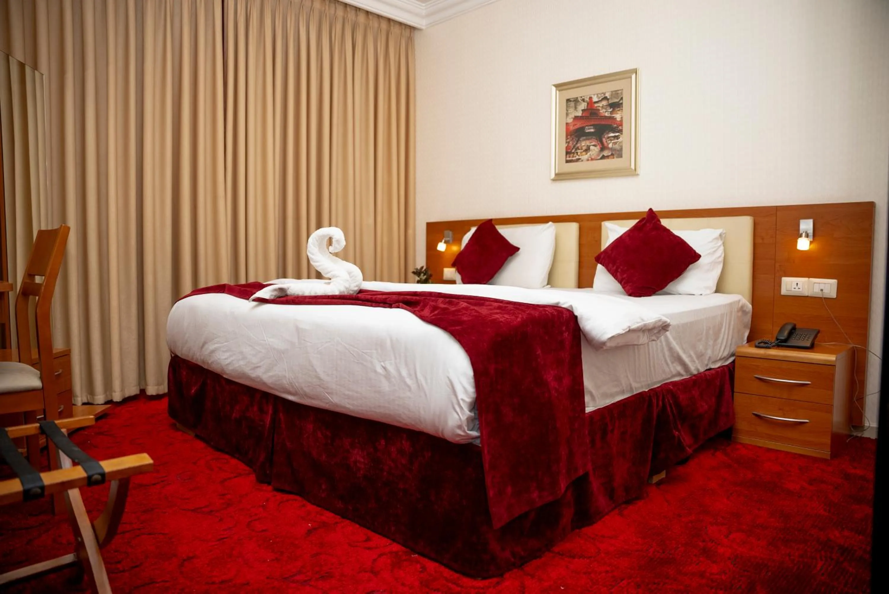 Bed in Sama Paris Plaza Hotel