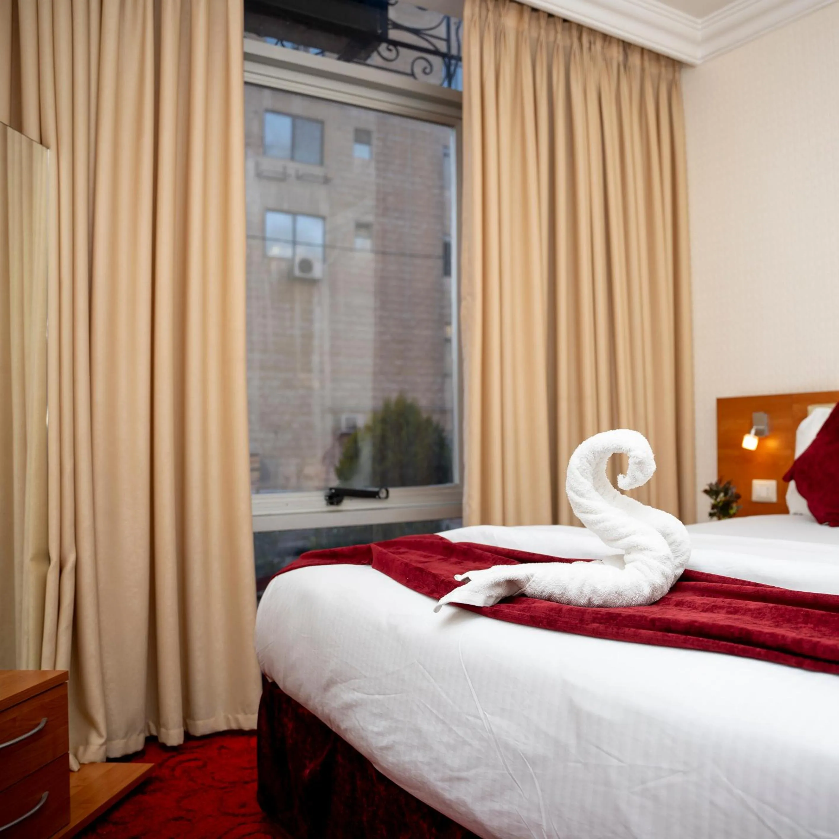 Bed in Sama Paris Plaza Hotel