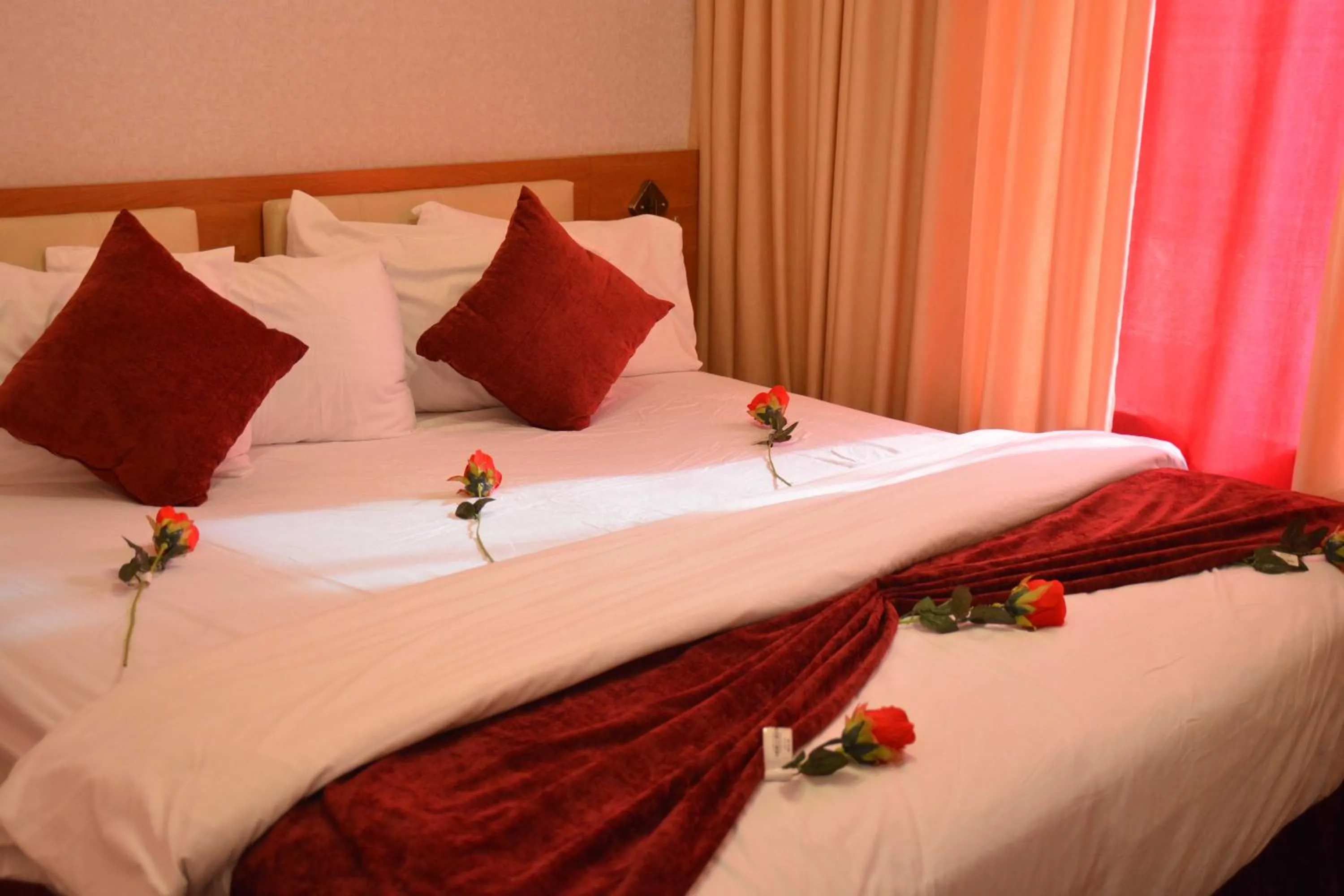 Bed in Sama Paris Plaza Hotel