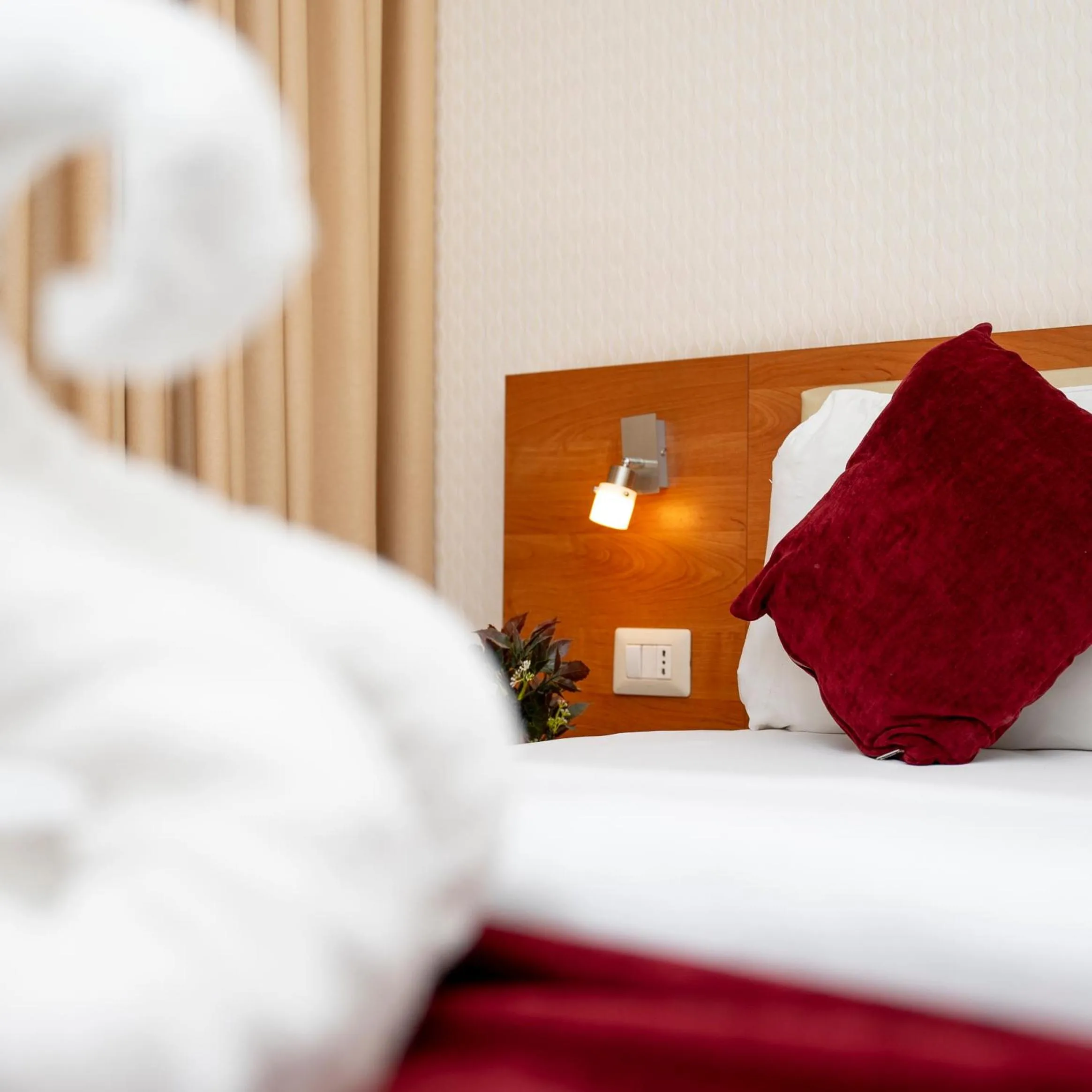 Bed in Sama Paris Plaza Hotel