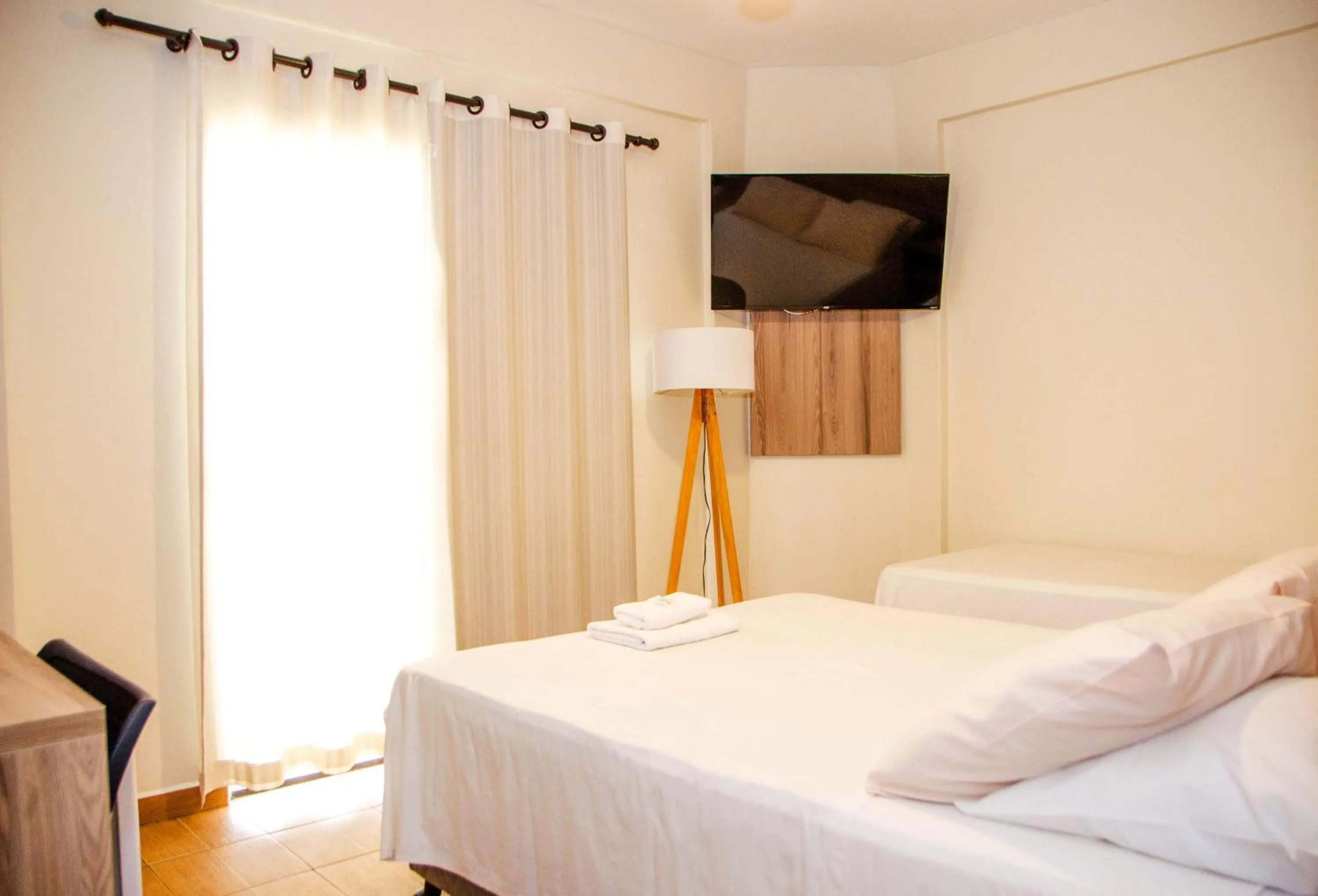 Bed in Hotel Zé Maria