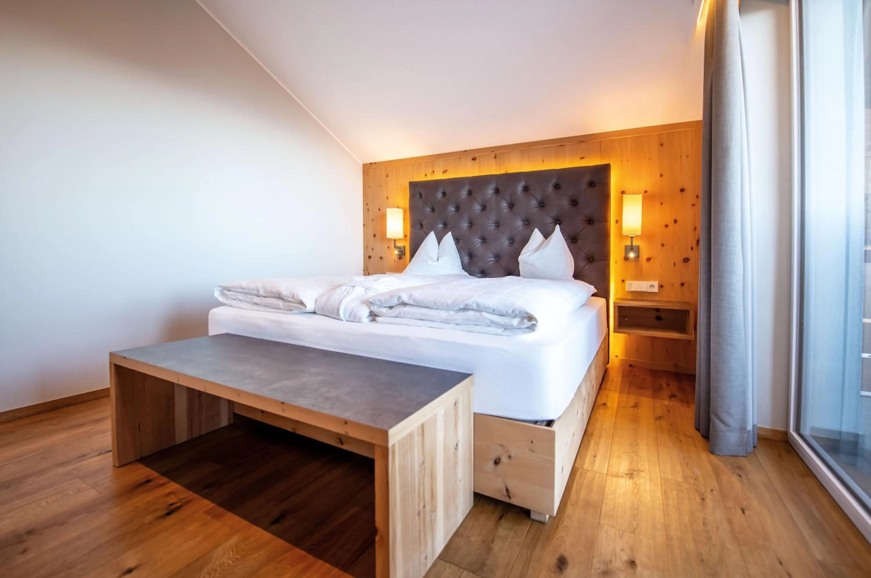 Bedroom, Bed in Hotel DAS ROYAL in Obereggen