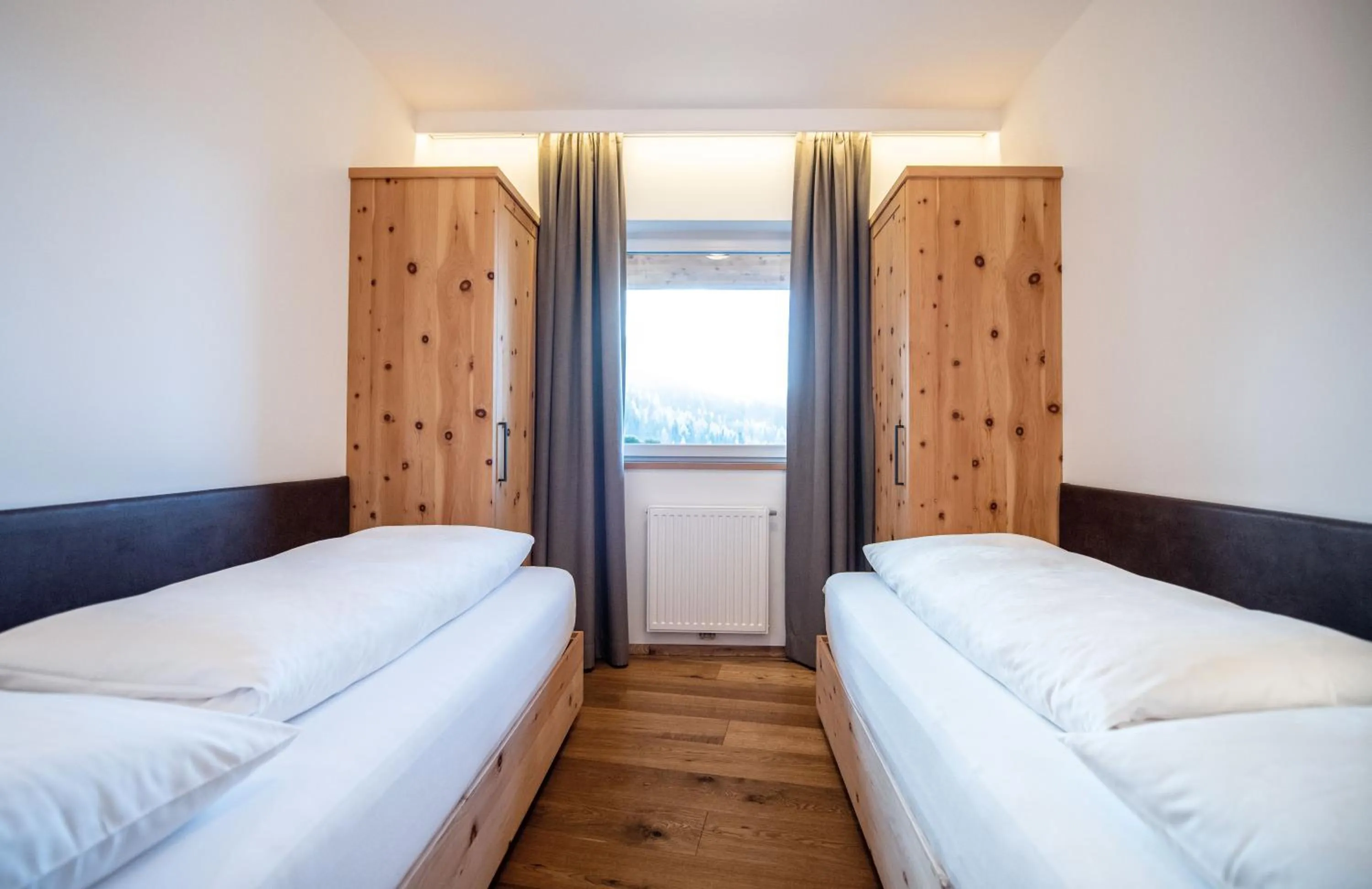 Bedroom, Bed in Hotel DAS ROYAL in Obereggen