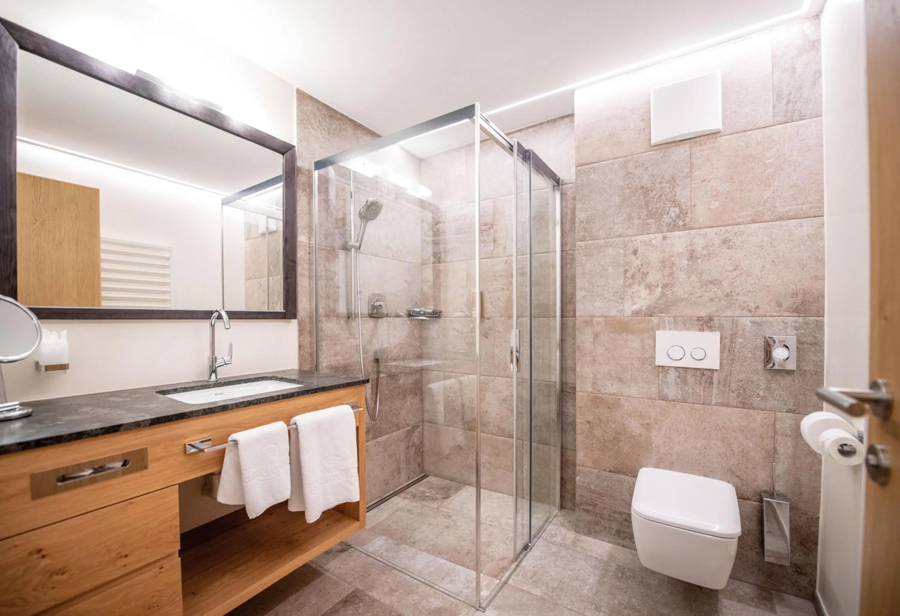 Bathroom in Hotel DAS ROYAL in Obereggen