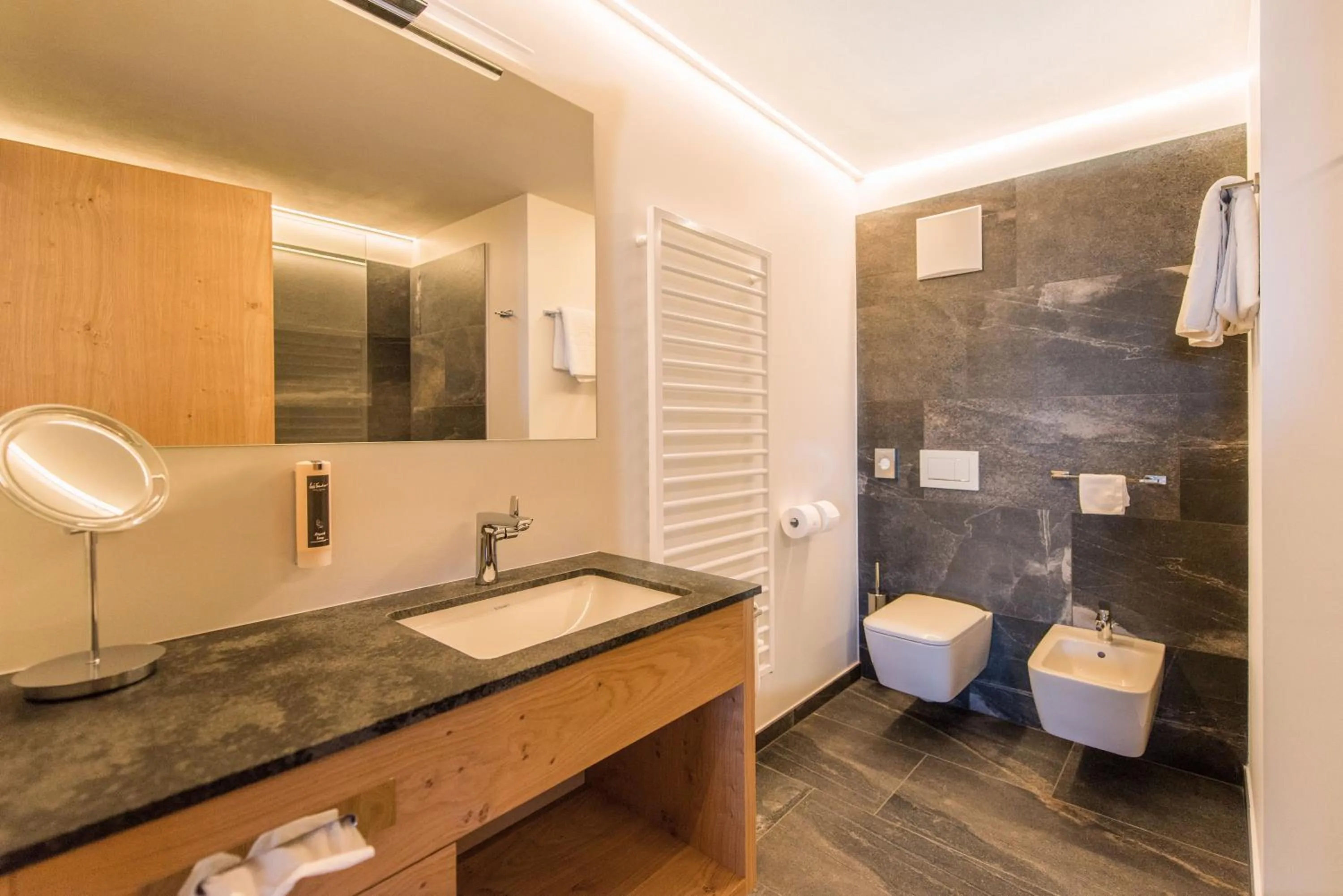 Bathroom in Hotel DAS ROYAL in Obereggen