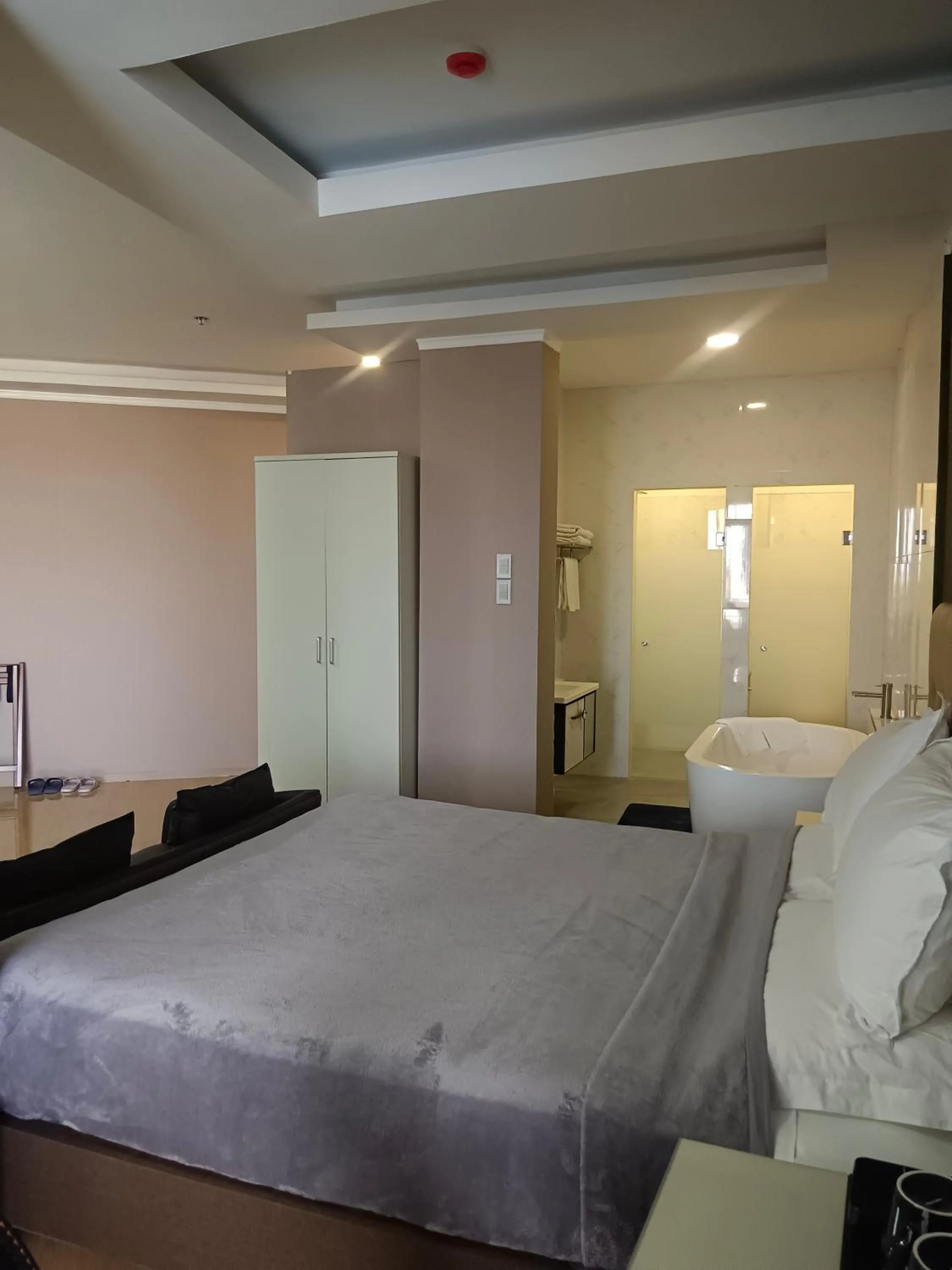 Bed in Blue Hotel and Resort