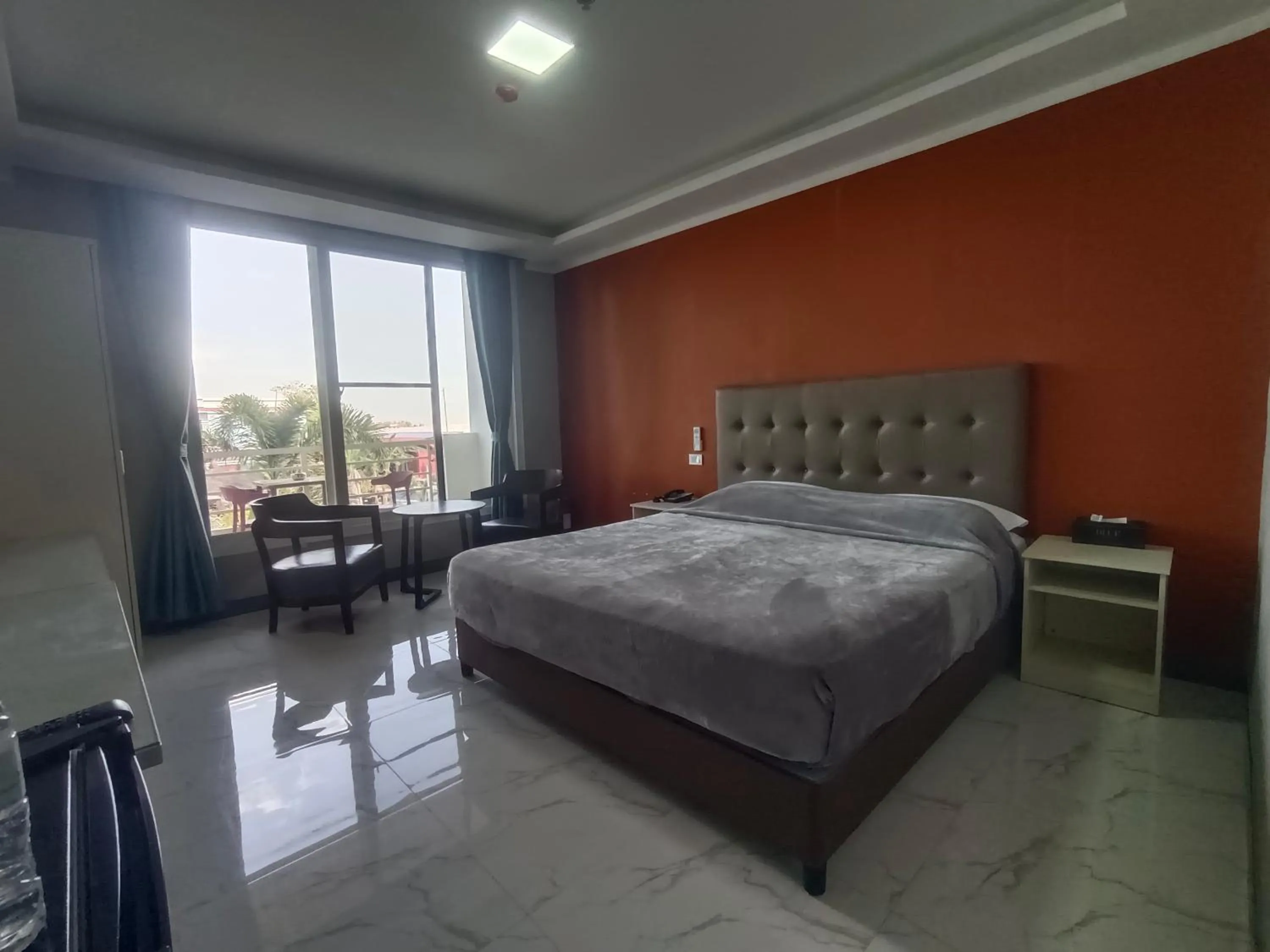 Bed in Blue Hotel and Resort