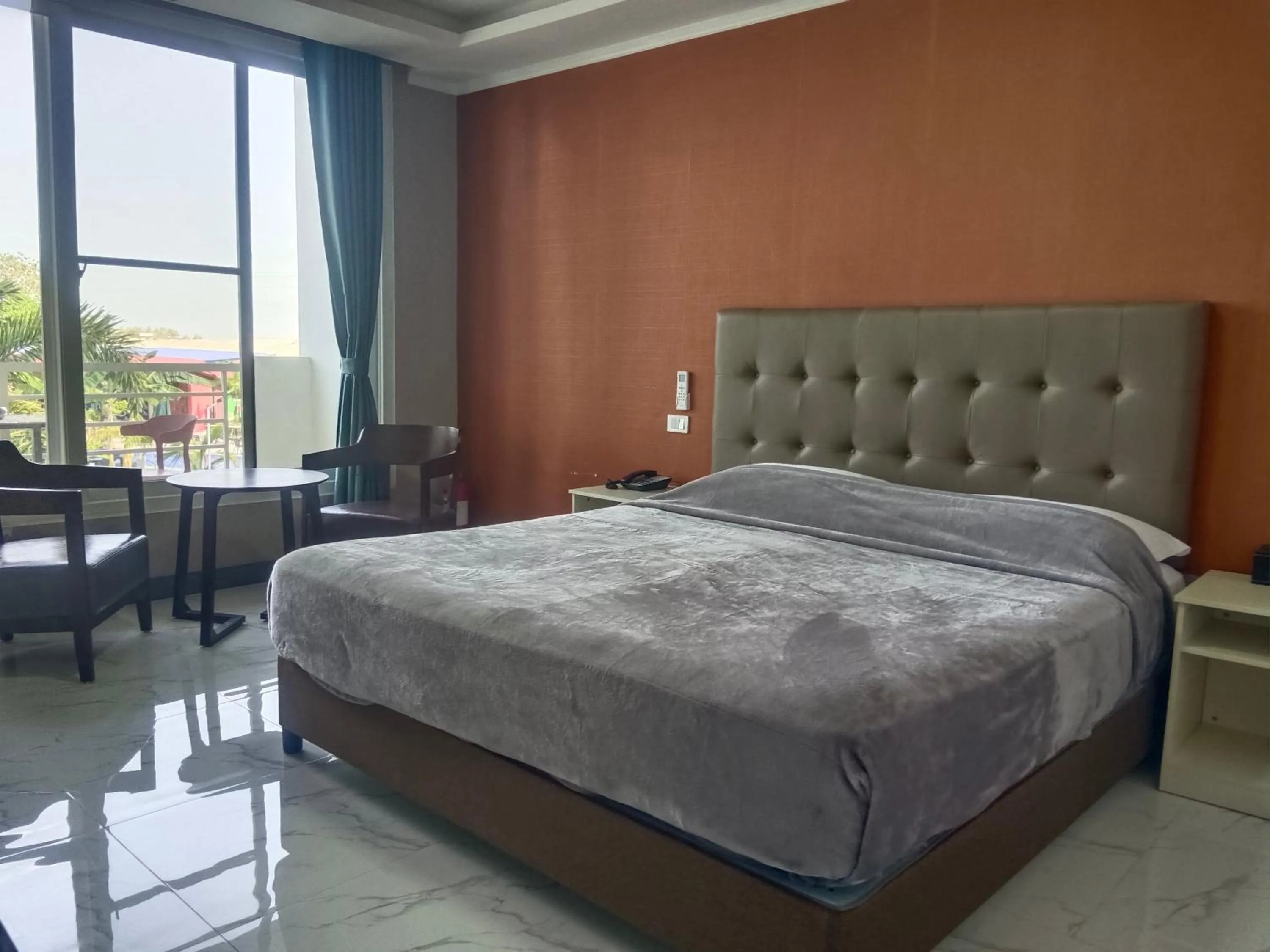 Bed in Blue Hotel and Resort