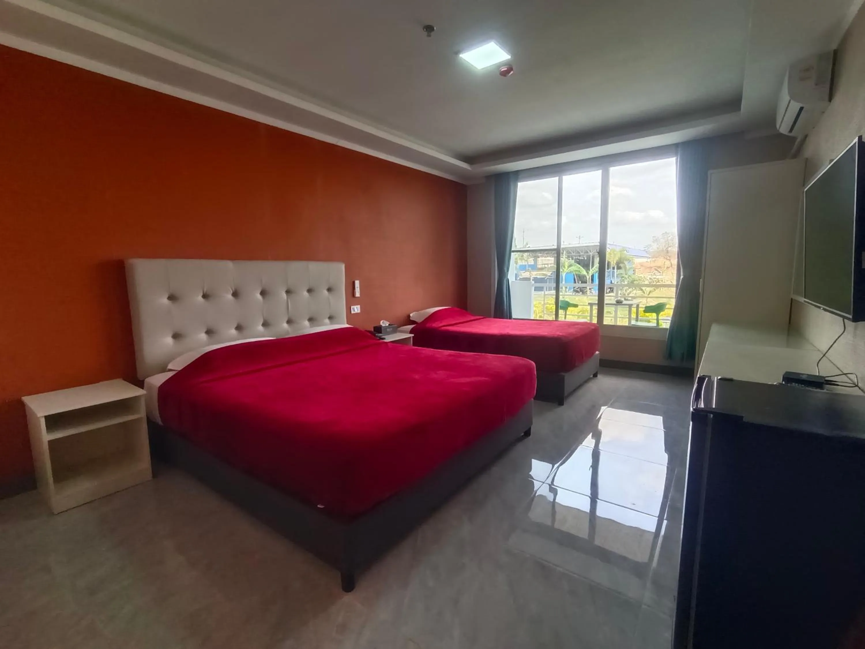 Bed in Blue Hotel and Resort