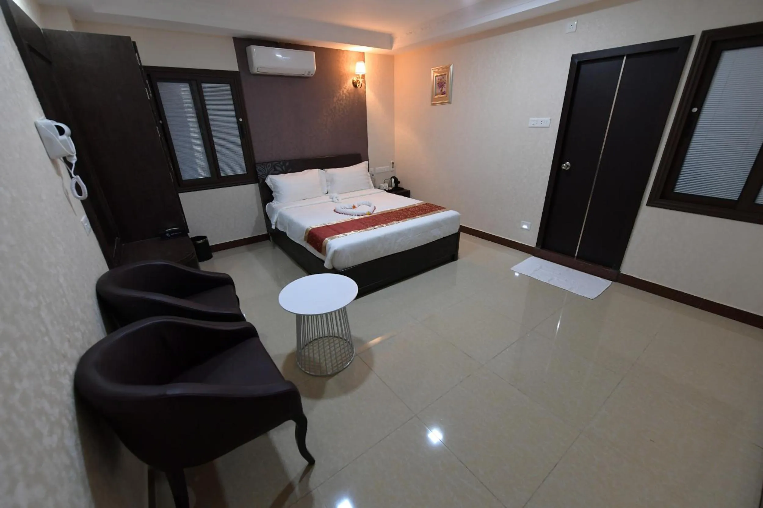 Bed in Coastal Grand Hotel Sampath