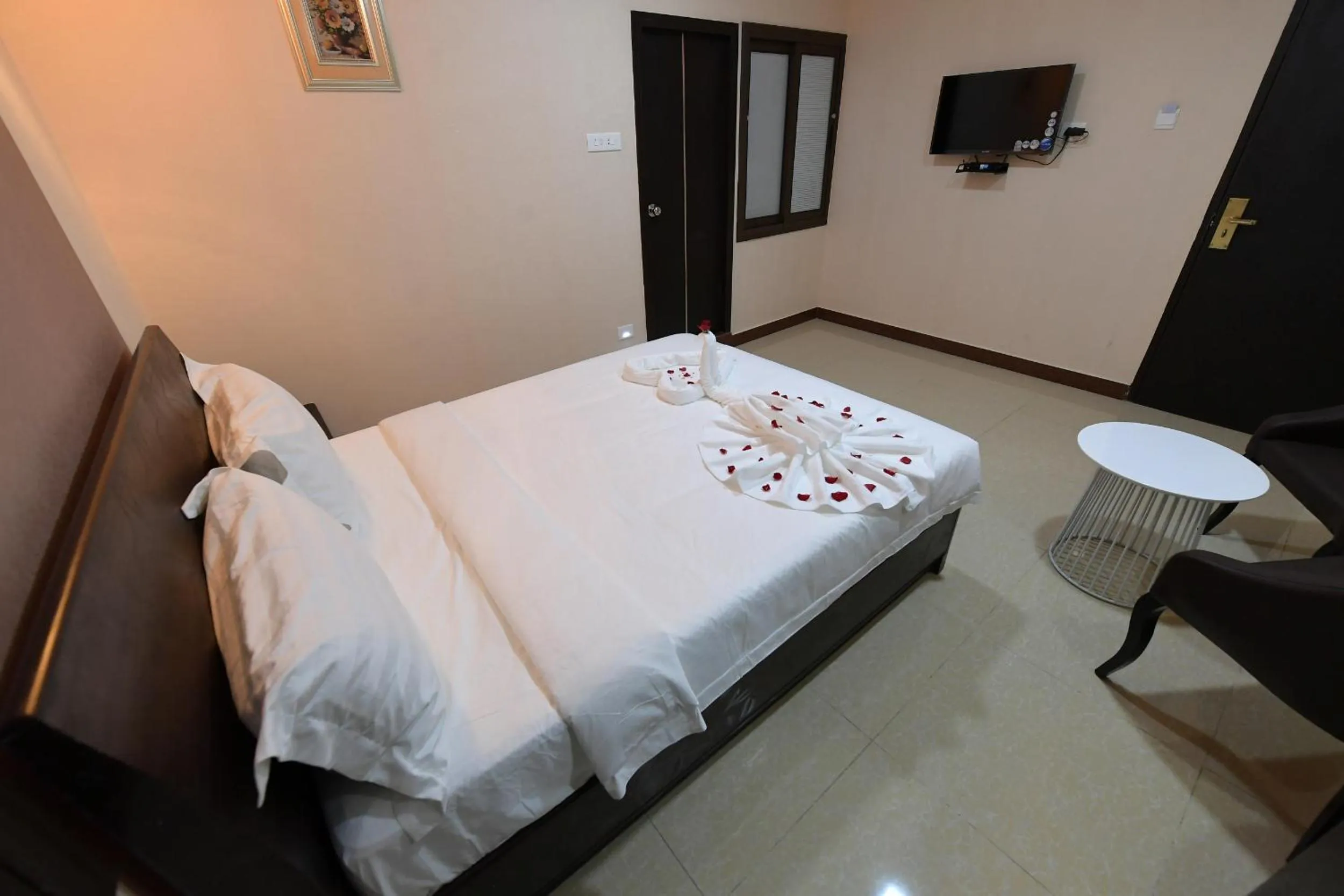 Bed in Coastal Grand Hotel Sampath