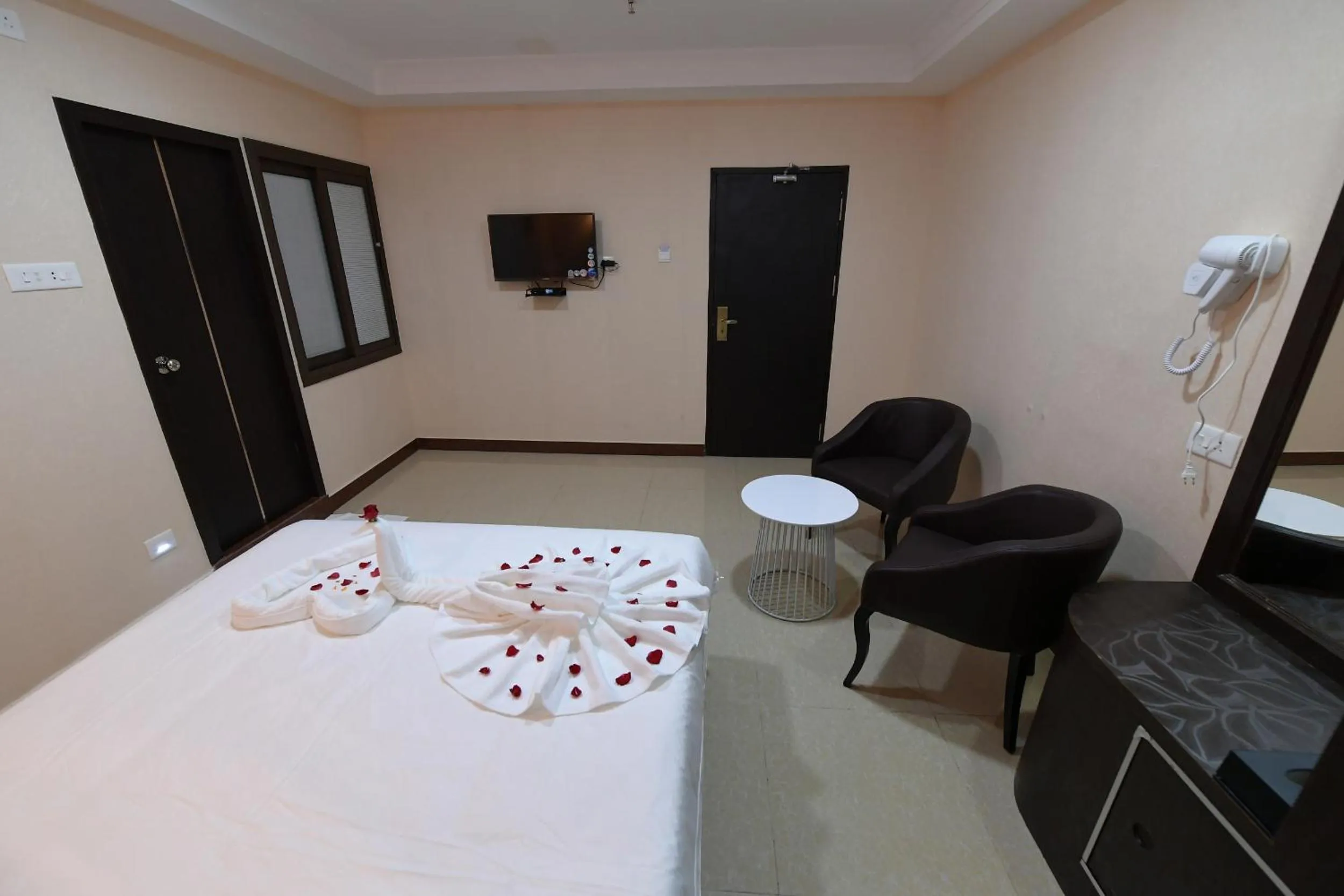 Bed in Coastal Grand Hotel Sampath