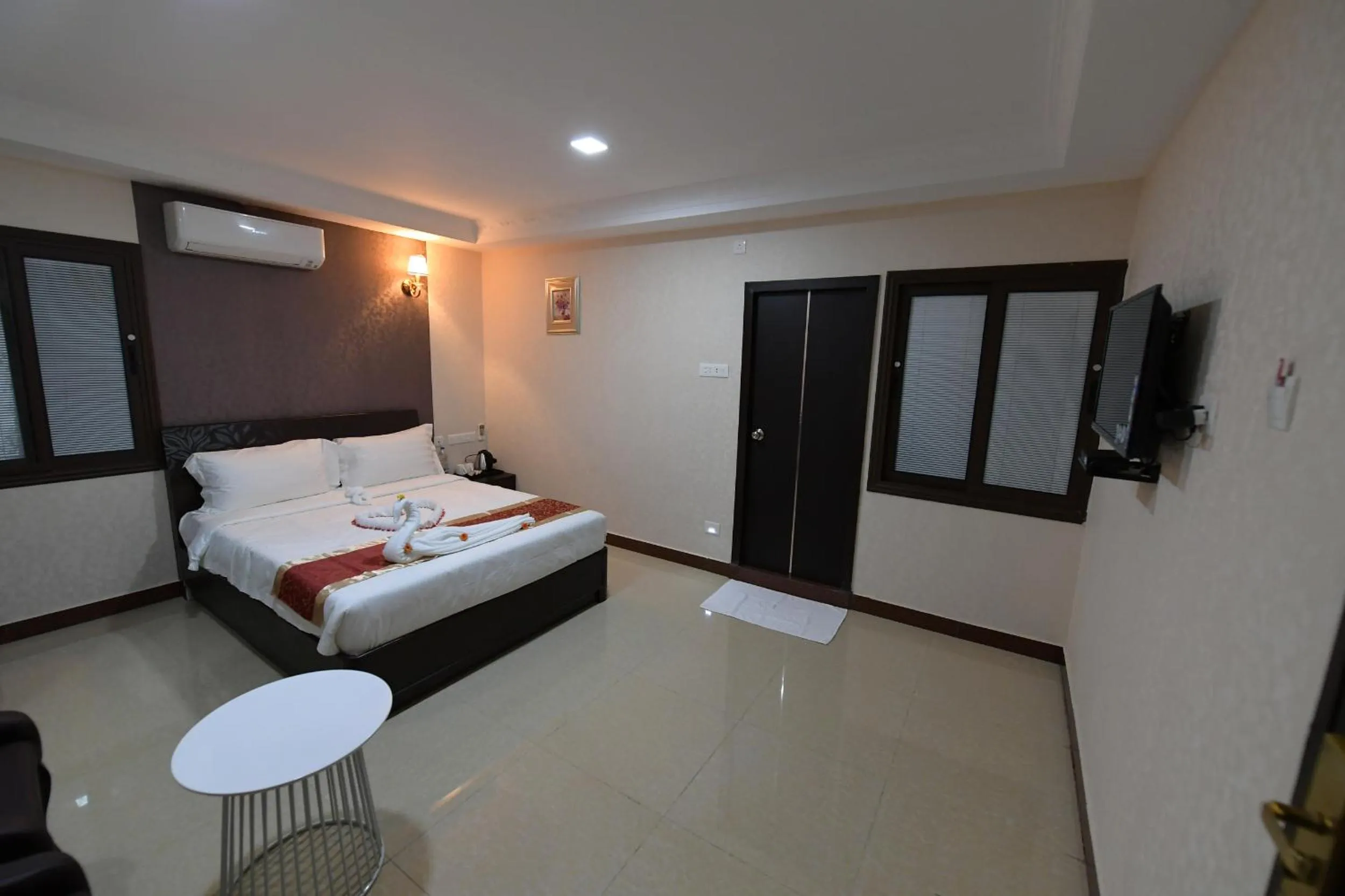 Bed in Coastal Grand Hotel Sampath