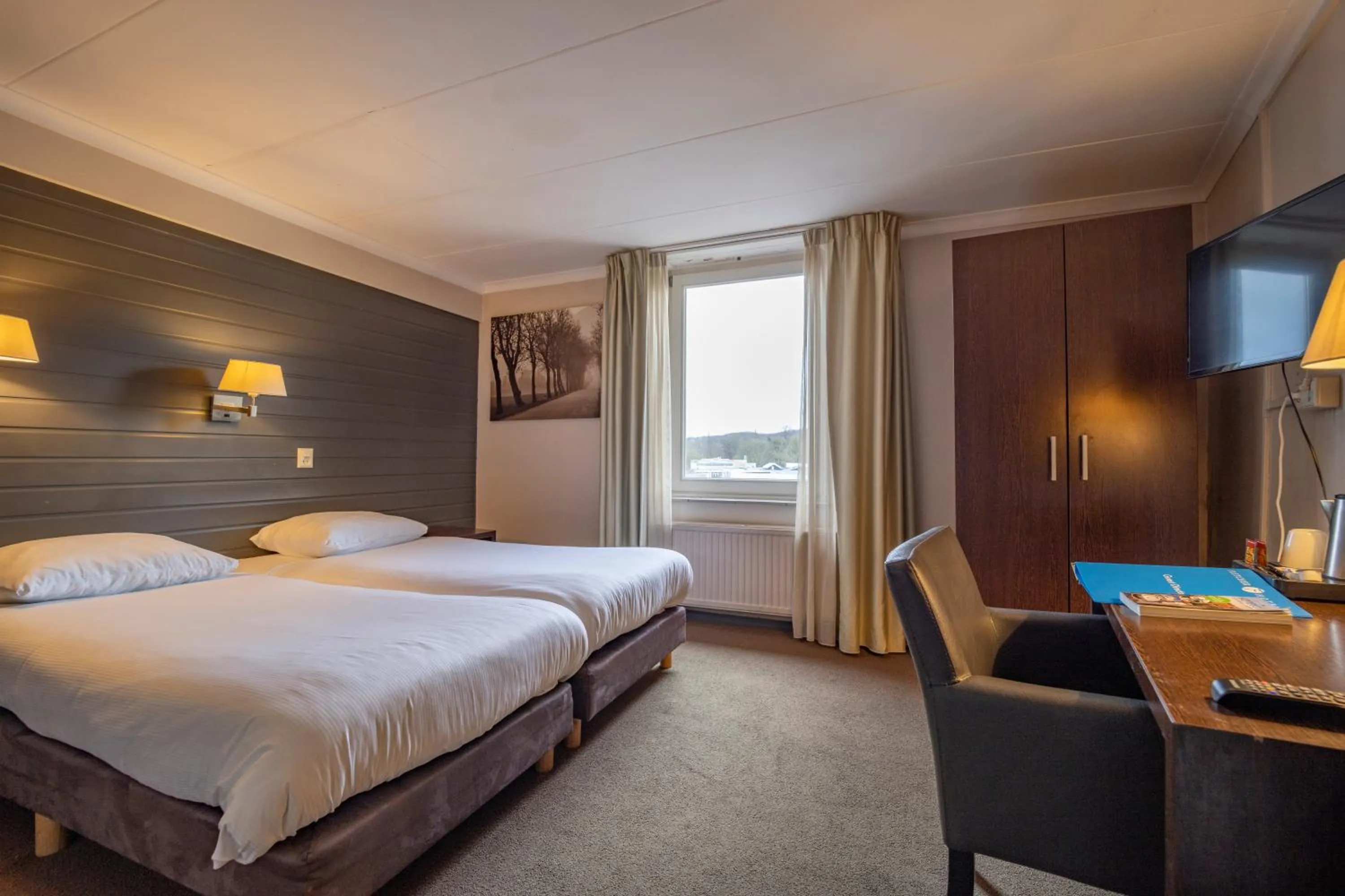 Photo of the whole room, Bed in Fletcher Hotel Restaurant De Geulvallei