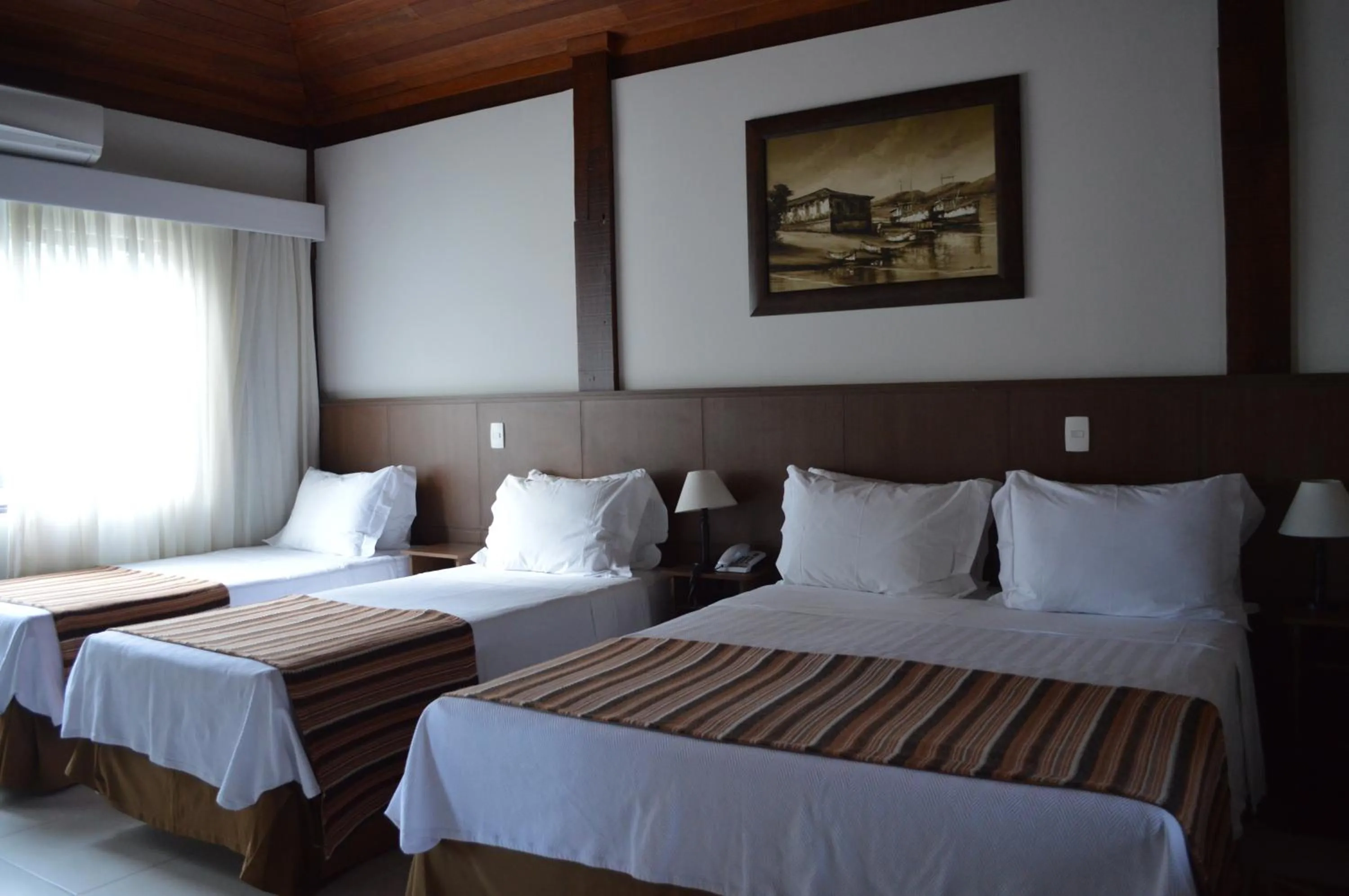 Bed in Pousada Terê Parque
