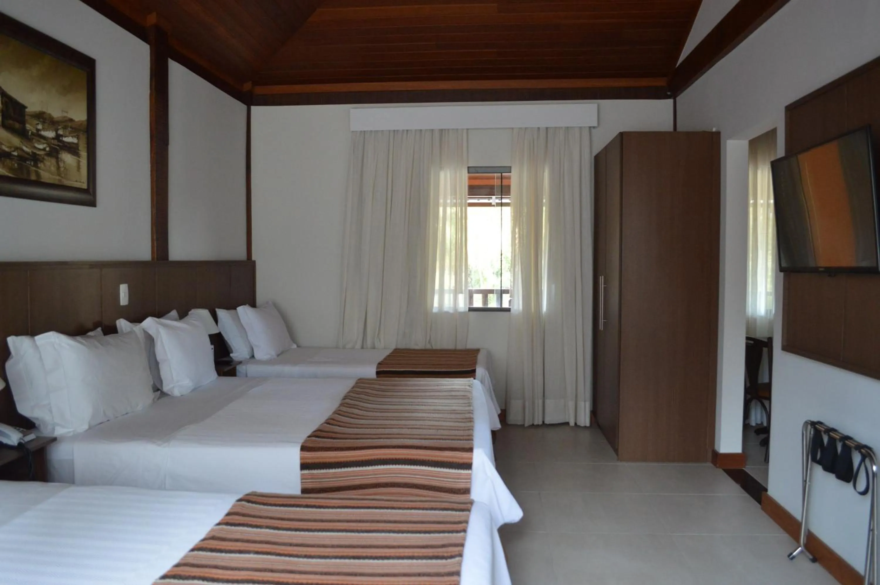 Bed in Pousada Terê Parque