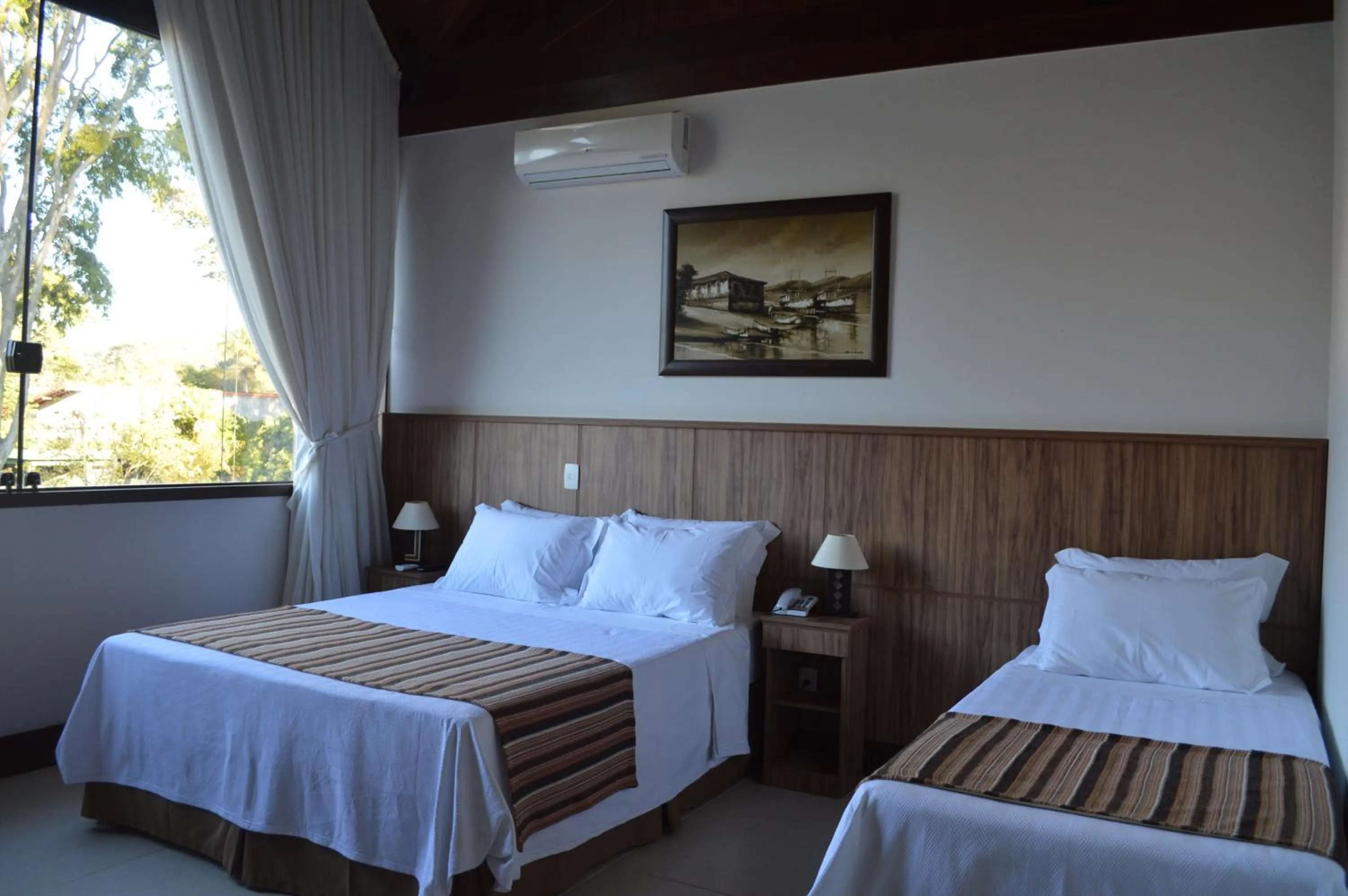 Photo of the whole room, Bed in Pousada Terê Parque