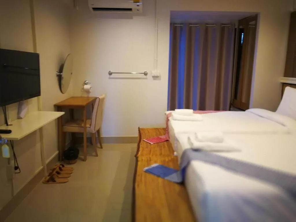 Bed in THOUSAND-TEN THOUSAND HOTEL