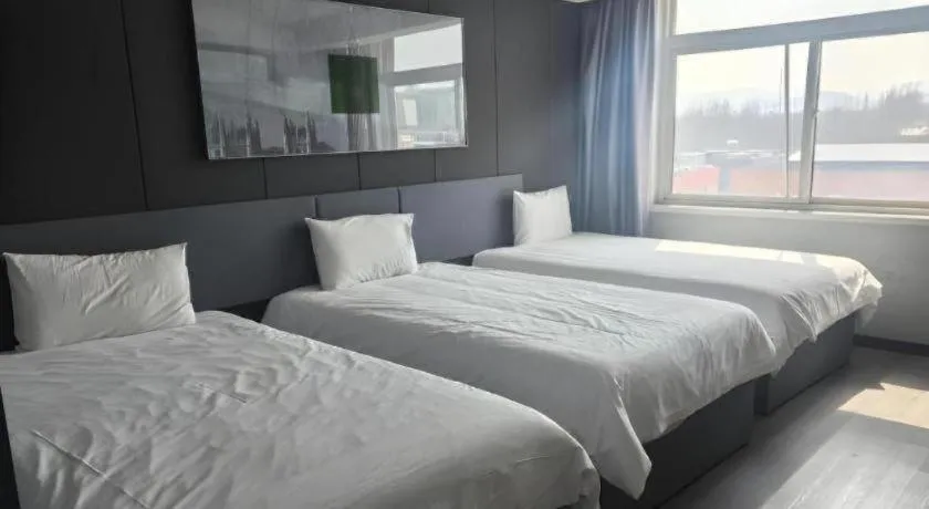Bed in Thank Hotel Shandong Linyii Pingyi County Commerce and Trade City