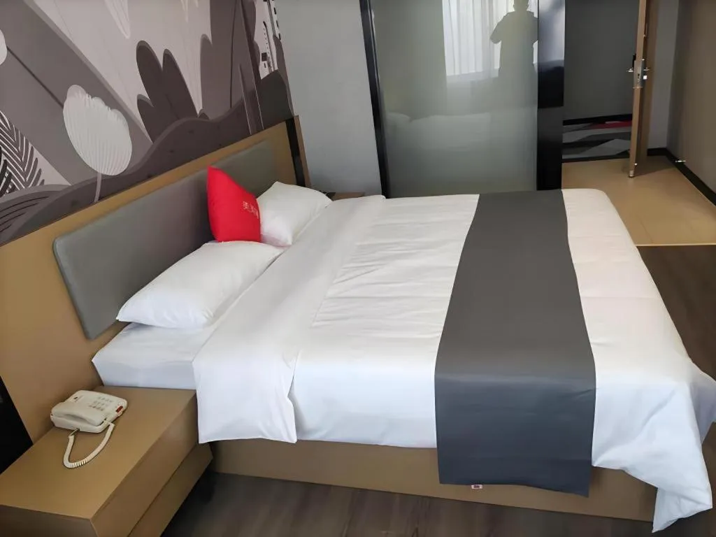 Bed in Thank Hotel Shandong Linyii Pingyi County Commerce and Trade City
