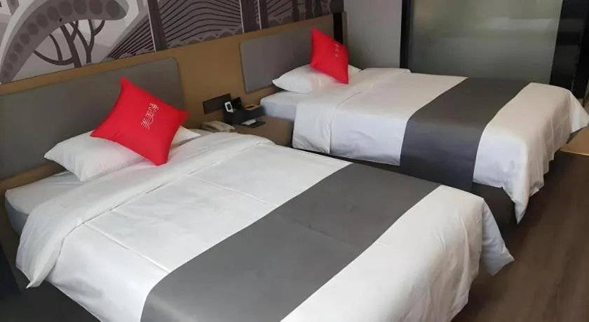 Bed in Thank Hotel Shandong Linyii Pingyi County Commerce and Trade City