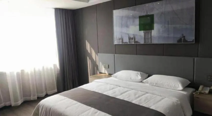 Bed in Thank Hotel Shandong Linyii Pingyi County Commerce and Trade City