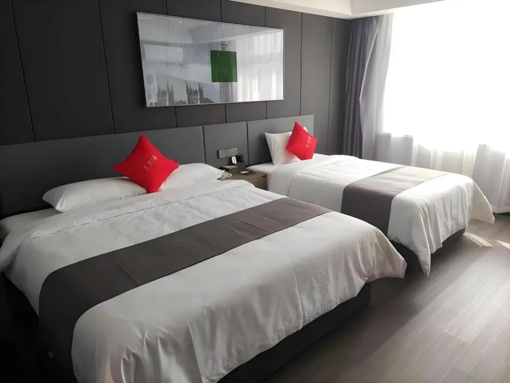 Bed in Thank Hotel Shandong Linyii Pingyi County Commerce and Trade City