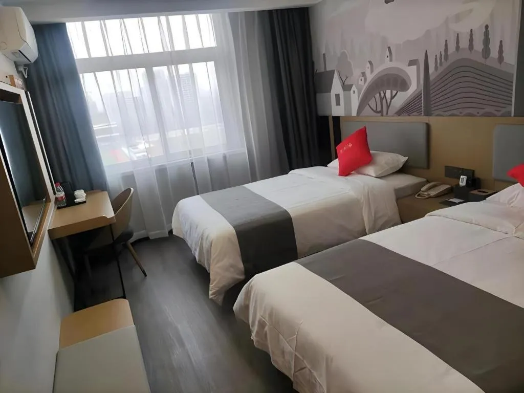 Bed in Thank Hotel Shandong Linyii Pingyi County Commerce and Trade City