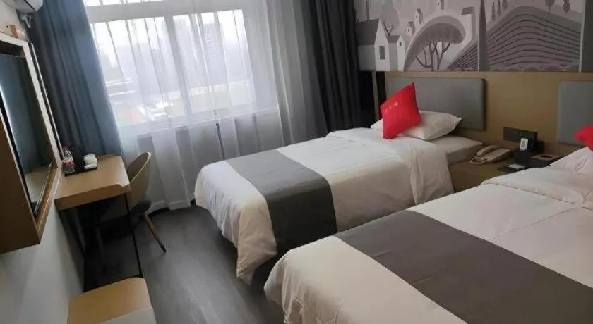Bed in Thank Hotel Shandong Linyii Pingyi County Commerce and Trade City