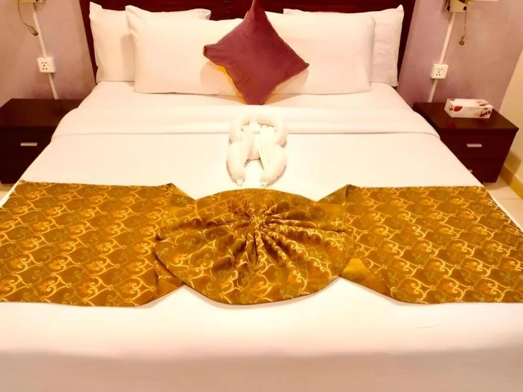 Bed in Lotus Furnished Hotel Apartments LLC. Ajman