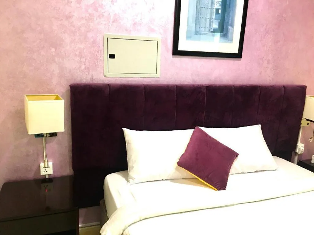 Bed in Lotus Furnished Hotel Apartments LLC. Ajman