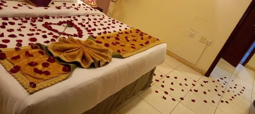 Bed in Lotus Furnished Hotel Apartments LLC. Ajman