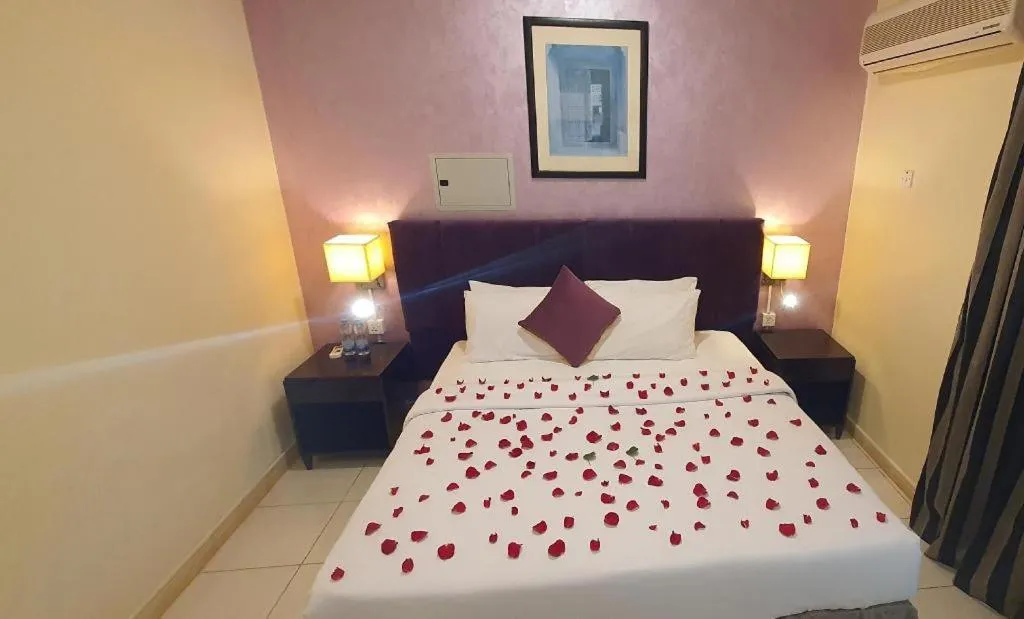 Bed in Lotus Furnished Hotel Apartments LLC. Ajman