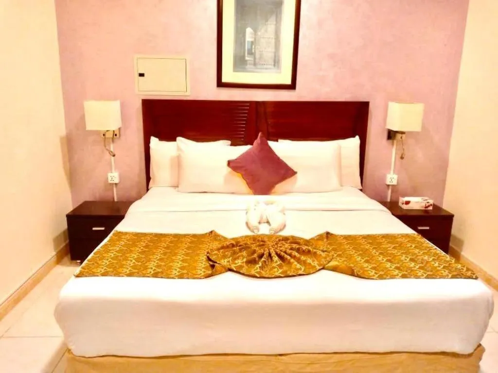 Bed in Lotus Furnished Hotel Apartments LLC. Ajman