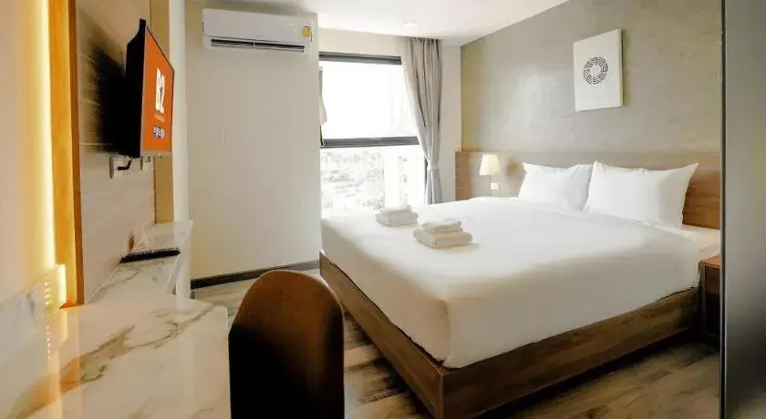 Bed in B2 Khon Kaen Premier Hotel Bed in B2 Khon Kaen Premier Hotel