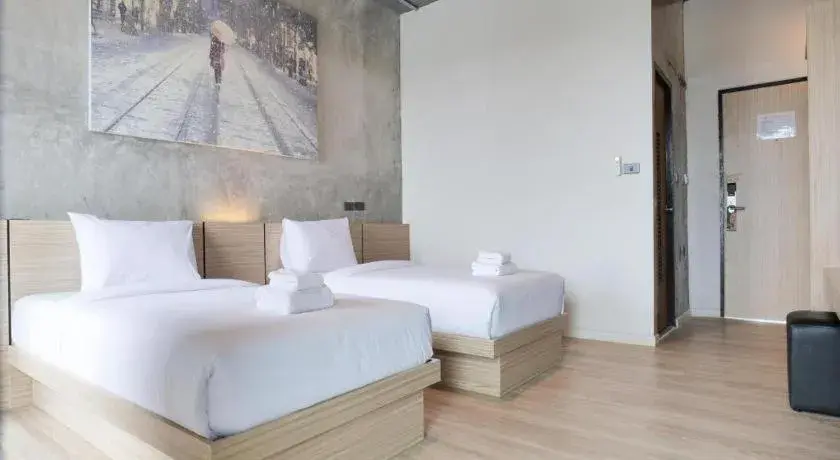 Bed in B2 Chiang Rai Phahonyothin Boutique & Budget Hotel Bed in B2 Chiang Rai Phahonyothin Boutique & Budget Hotel