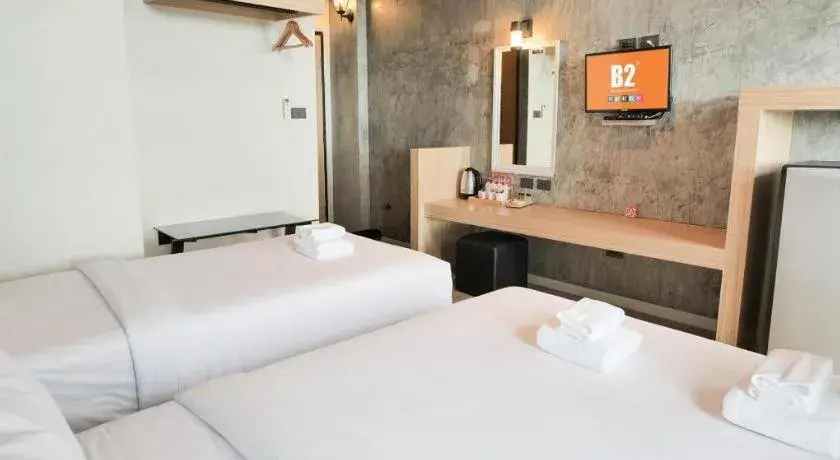 Bed in B2 Chiang Rai Phahonyothin Boutique & Budget Hotel Bed in B2 Chiang Rai Phahonyothin Boutique & Budget Hotel