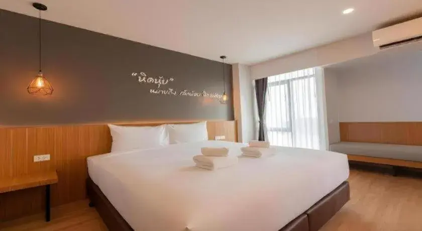 Bed in B2 Chiang Rai Phahonyothin Boutique & Budget Hotel Bed in B2 Chiang Rai Phahonyothin Boutique & Budget Hotel