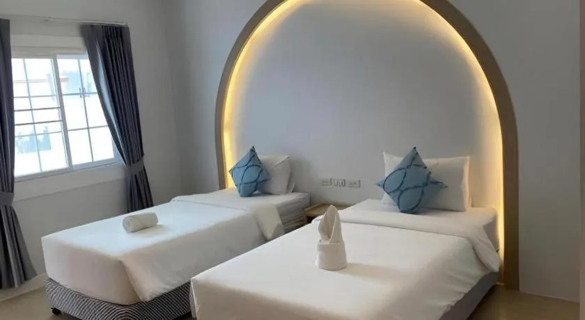 Bed in Thong Prachok Hotel