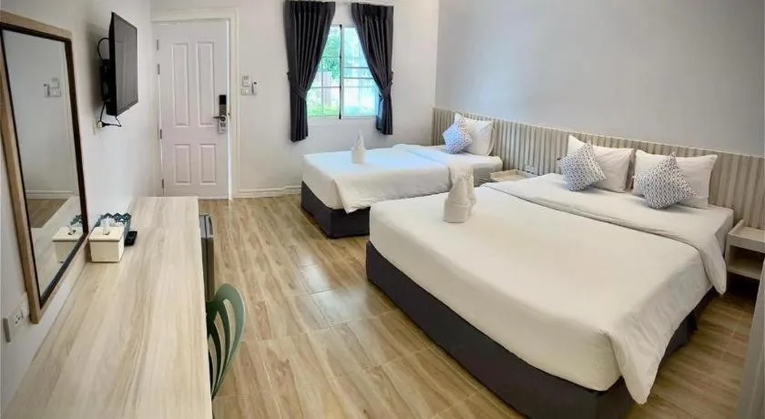 Bed in Thong Prachok Hotel