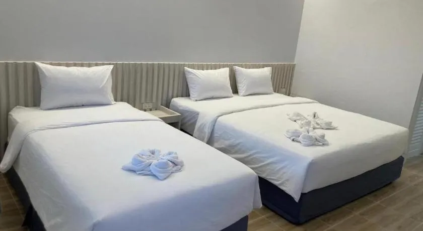 Bed in Thong Prachok Hotel