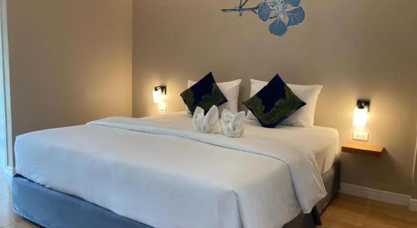 Bed in Thong Prachok Hotel