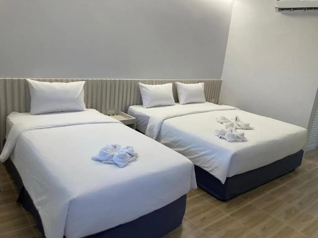 Bed in Thong Prachok Hotel